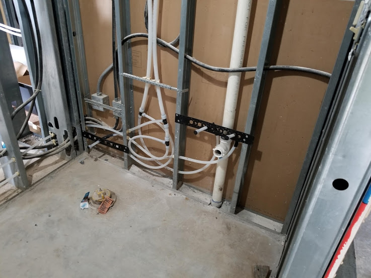 Affordable Plumbing crew completing a sewer line replacement job in Jefferson City, MO